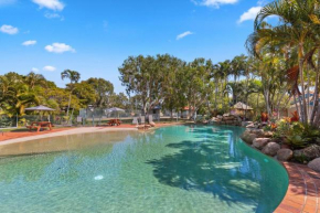 Sandy Straits Poolside Escape with Beach Access